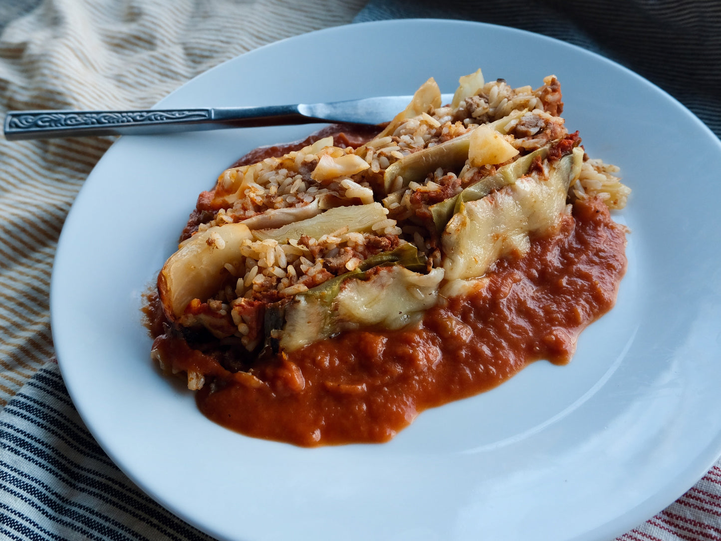 Gratin de choux farcis au porc haché « Berkshire » et sauce tomate