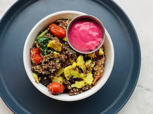 Organic Quinoa with Chickpeas, Turmeric Cauliflower, Cherry Tomatoes, Spinach, Eggplant & Beet Tahini Sauce